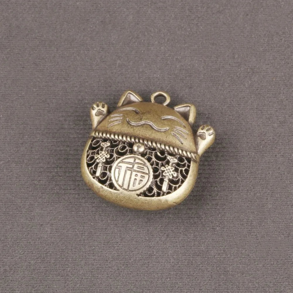 Amulette Maneki Neko dorée