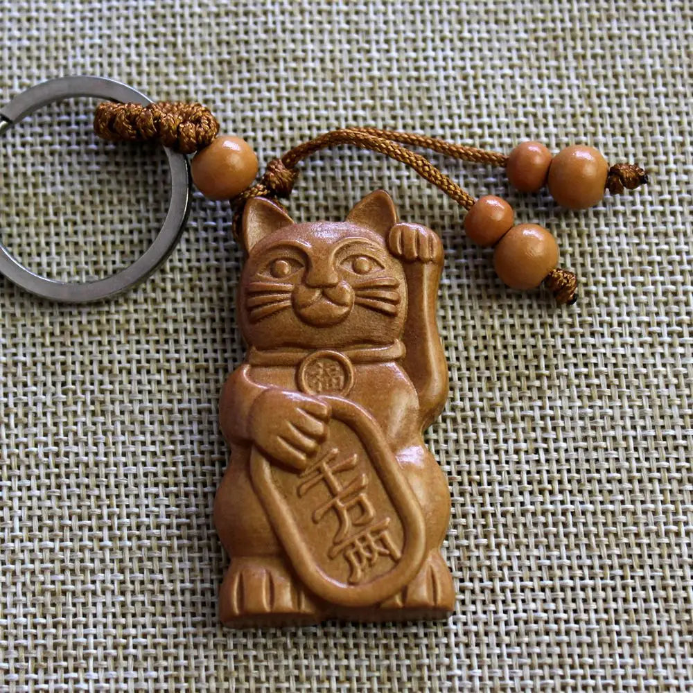 Porte-clef Maneki Neko en bois (foncé)