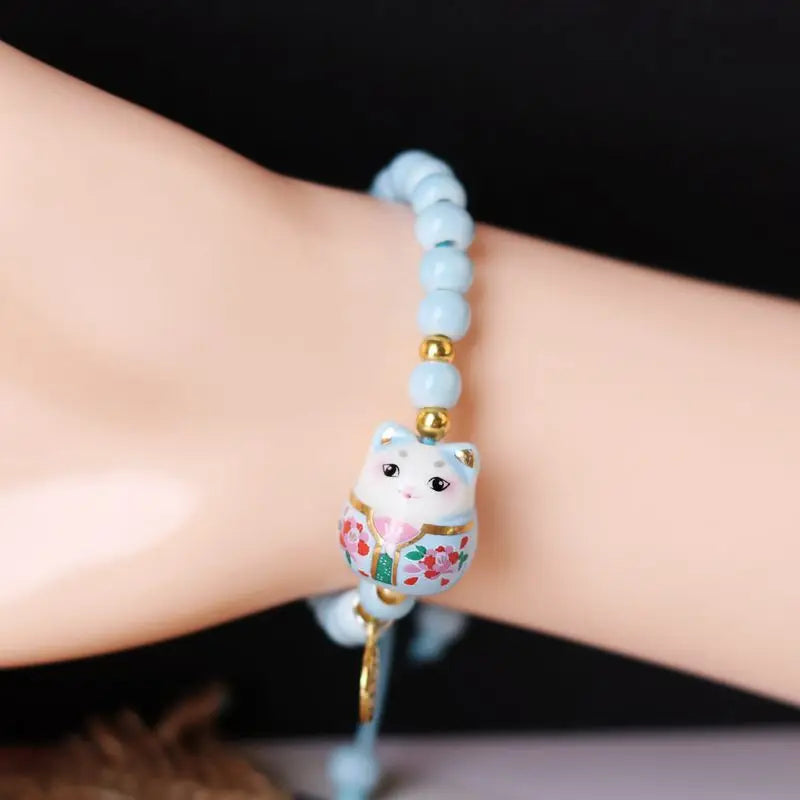 Bracelet chat japonais bleu clair