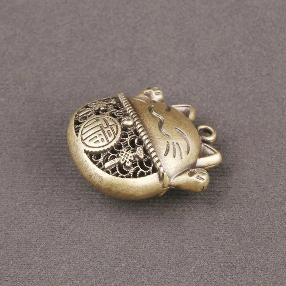 Amulette Maneki Neko dorée