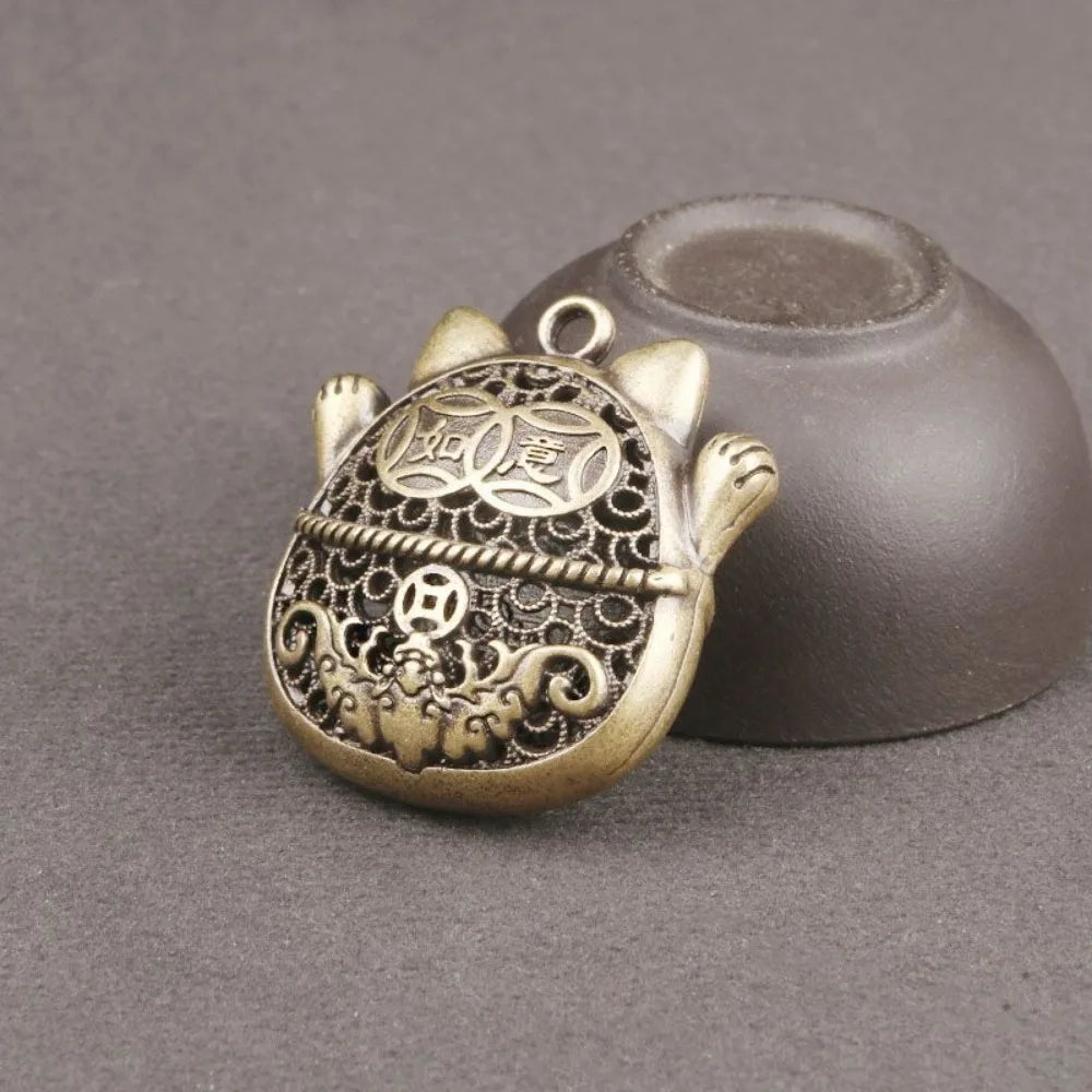 Amulette Maneki Neko dorée