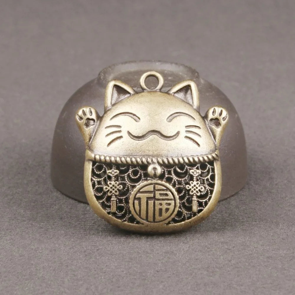 Amulette Maneki Neko dorée