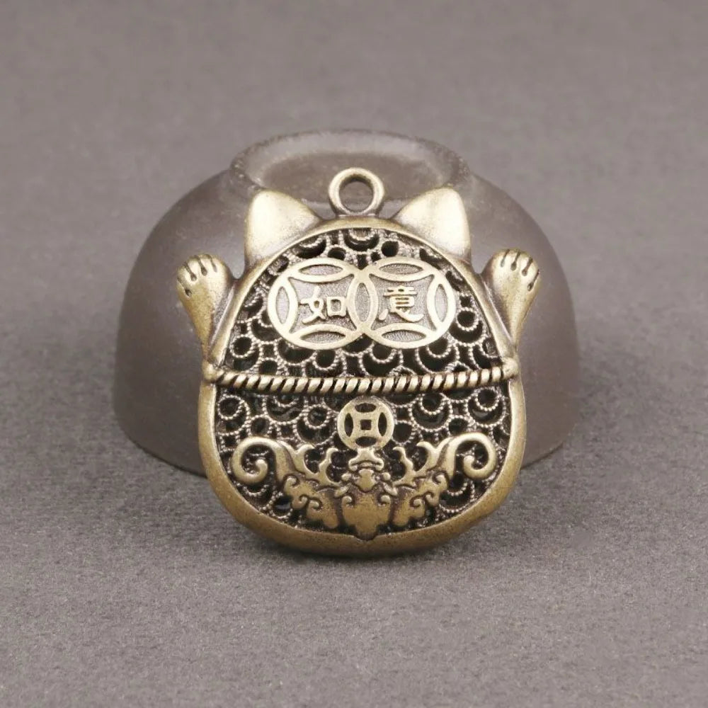 Amulette Maneki Neko dorée