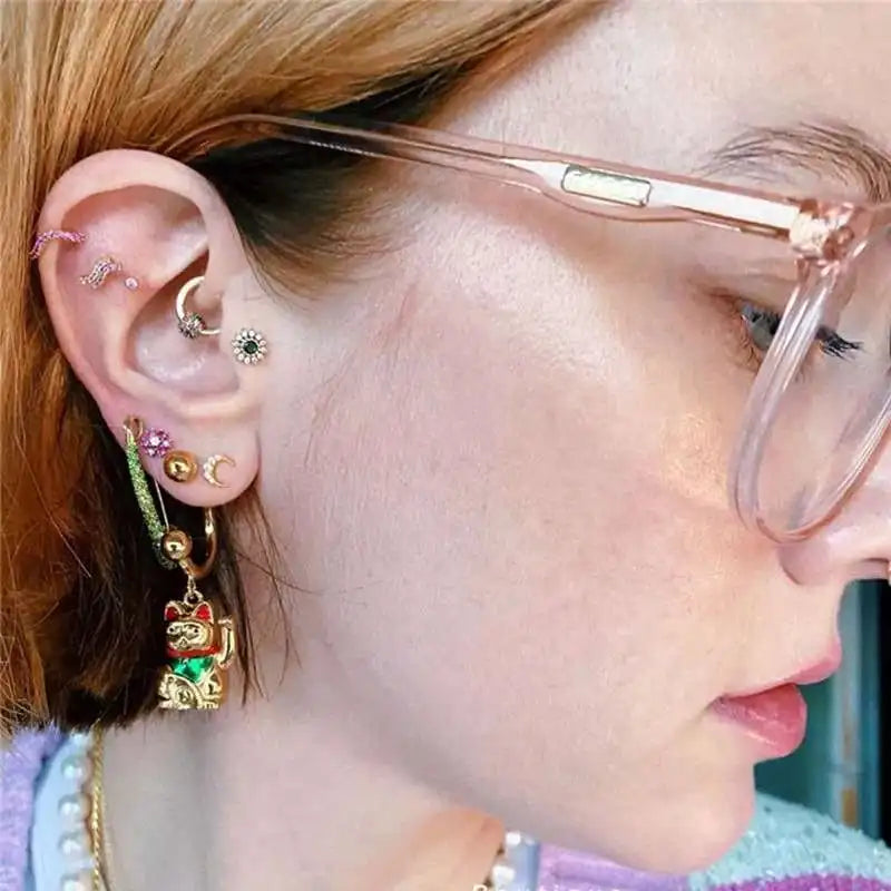 Boucle d'oreille Maneki Neko doré