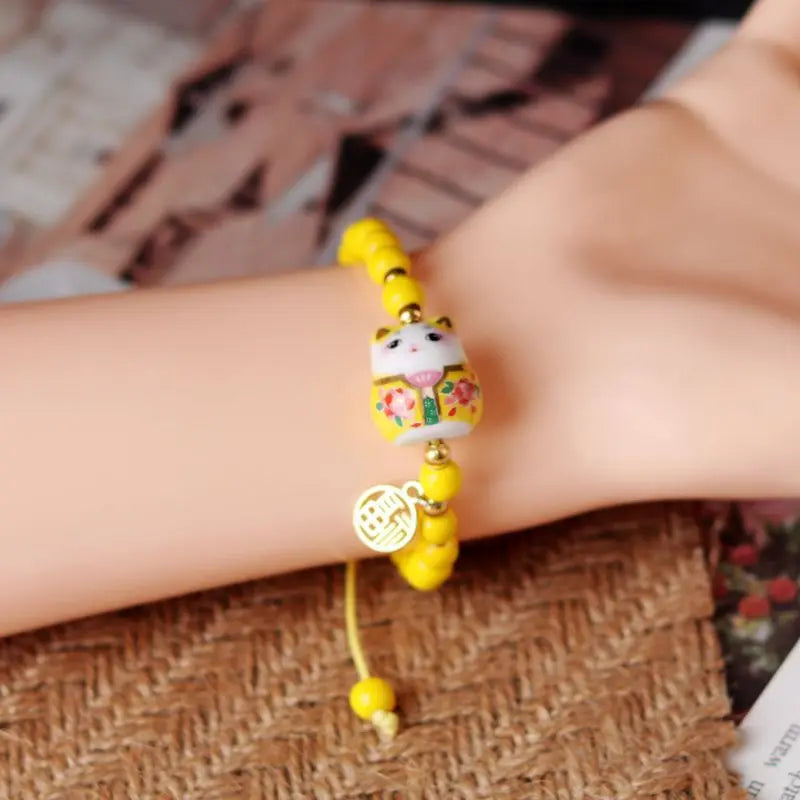 Bracelet chat japonais jaune
