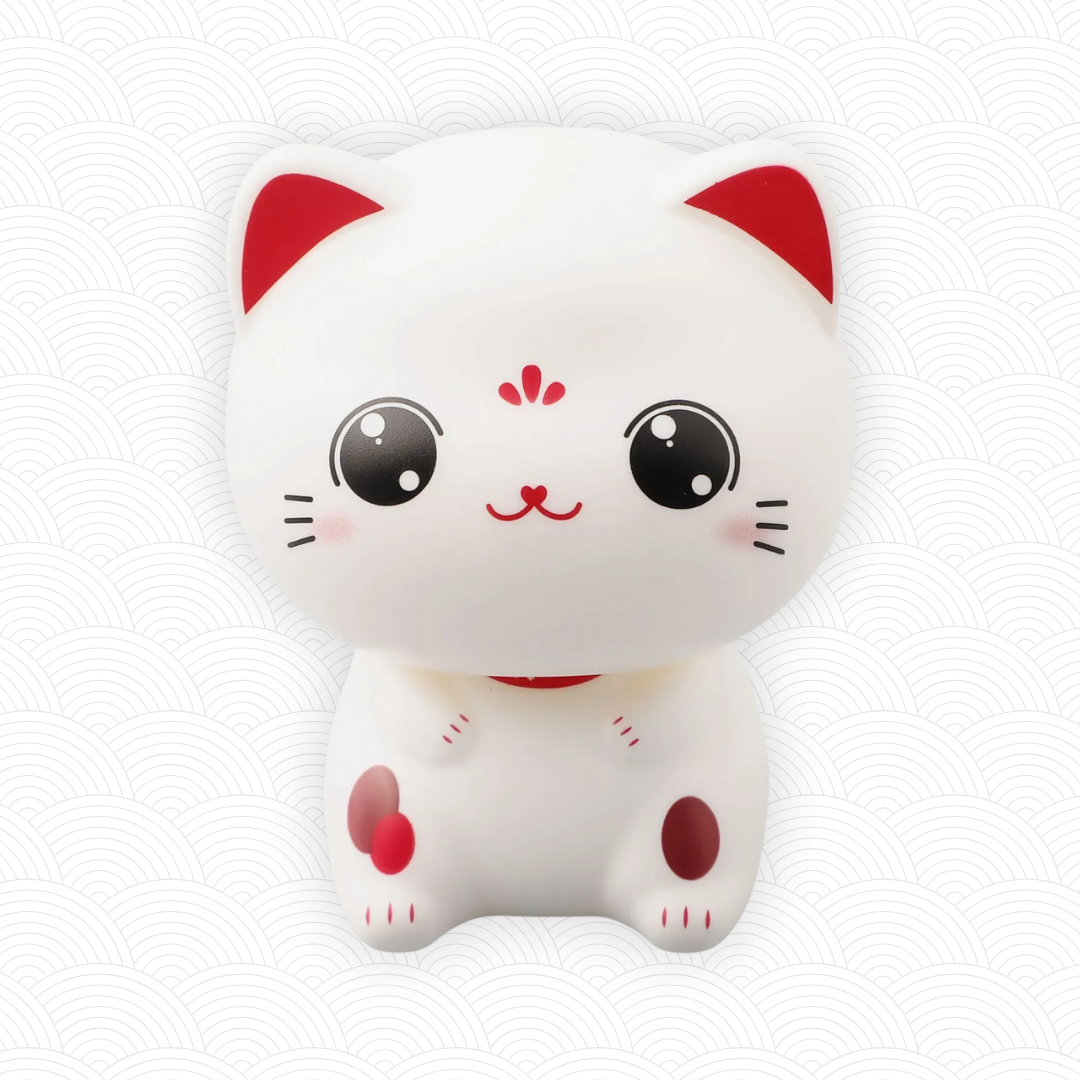 petite-figurine-maneki-neko-solaire-blanc-curieux